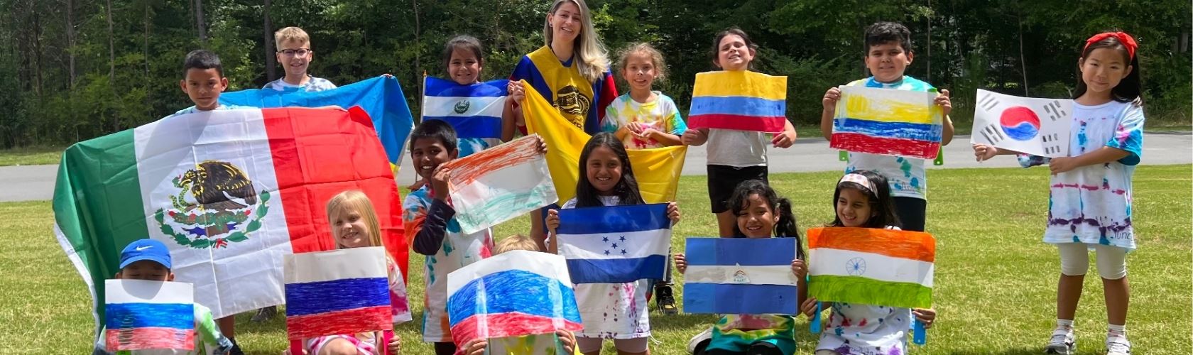 Multicultural group of children holding their countries flag.